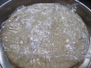 wrap cake well and allow to sit at room temp for 1 hour then refrigerate