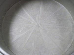 line the bottom of your cake pan with a parchment circle