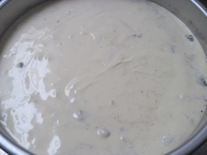 cheesecake batter in pan before cooking