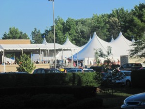 huge outdoor tents for outdoor seating as seen from across the street
