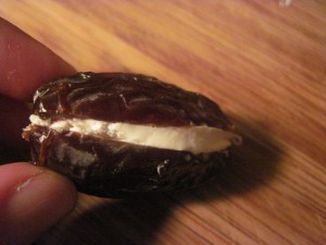 fill cavity with goat cheese and close as well as you can