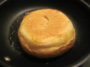 slice rolls and gently toast both halves in a skillet with a little oil or butter
