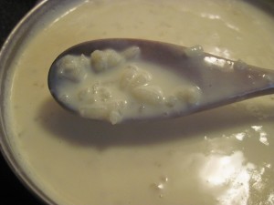 once custard has thickened, pour into a greased dish to finish baking in the oven