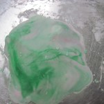 flatten out the piece of fondant and swirl on a little more of the food coloring