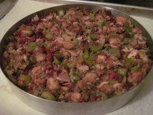 pour into a greased mold and gently press to pack together