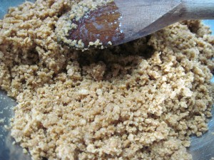 preparing the crust for eggnog cheesecake