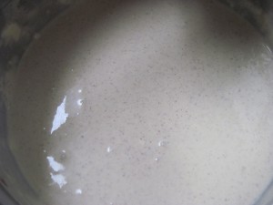 perfectly smooth eggnog cheesecake batter ready to be poured into pan