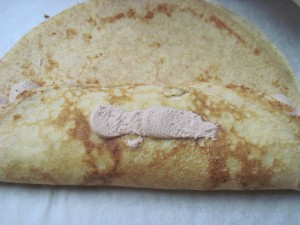 fold one side up, add a little cream to glue the other side