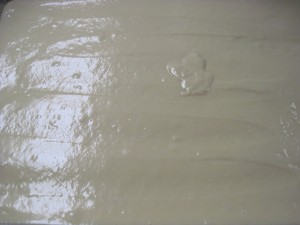 spread cake batter evenly in pan