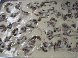 add the cinnamon swirl and mix into batter, then add the other cup of chocolate chips