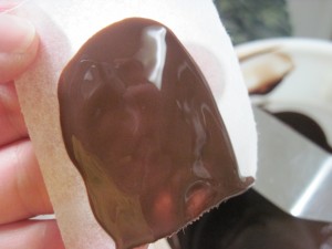spread the chocolate onto a small piece of paper