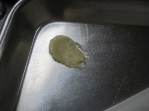 add a little batter to sides of the sheetpan to secure parchment paper to the pan