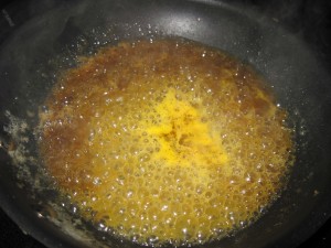 add the orange juice and stir well until everything melts together then remove from heat