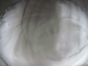 whip the egg whites and add the sugar a little at a time
