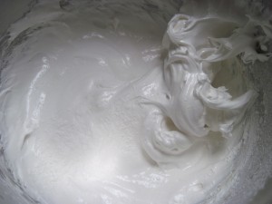 once whipped, add the vinegar, vanilla and cornstarch and continue beating until all is incorporated and stiff