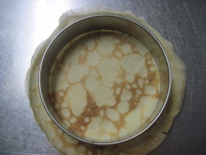 use largest cookie cutter to cut perfect rounds out of each small crepe