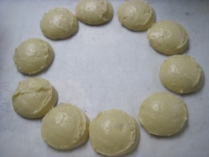 scoop out eclair dough close but not touching so that as they puff they will bake together