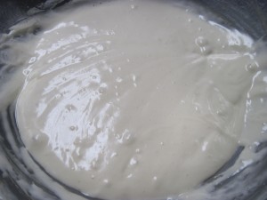 add the whites to the paste and create a light and fluffy batter
