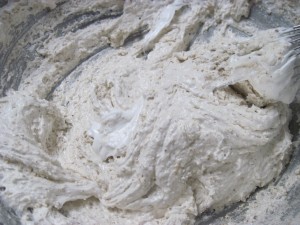 add half of meringue and whisk in