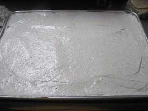 pour into paper lined half sheet pan