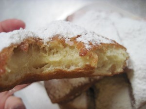 beignets dusted with powdered sugar that just melt in your mouth