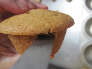 swipe across the inside of the cake, keeping the cut minimal