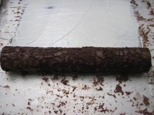 Roll into small logs then repeat, you will get about 3 logs from one sheet of cake