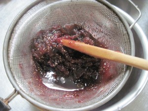 use a wooden spoon to create a paste from the remaining fig pulp