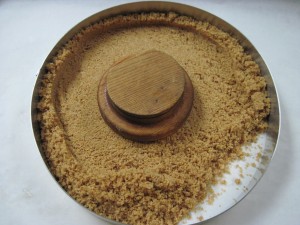 pour into your mold or prepared pie plate and begin pressing down to set and form the crust