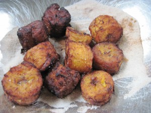 Remove from oil onto a paper lined plate, add coarse salt and toss in spicy sugar