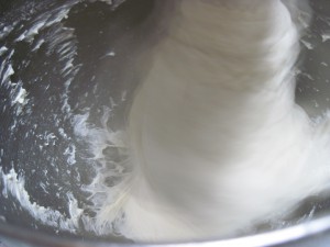the longer you beat the ciabatta dough, the more it begins to pull away from the bowl