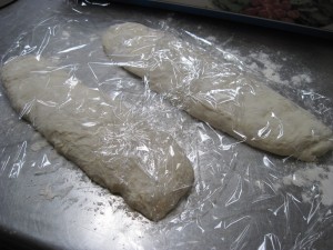cover ciabatta dough loosely with plastic and allow to proof for another 30 minutes on the floured counter