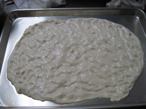 add to an oiled sheet pan and spread out with your fingers