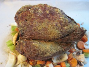 sear all the way around until it looks like this, then place on top of veggies in parchment sheet