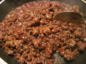 ground beef with Hot BBQ sauce that has been reduced