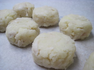 Round and flatten Baltimore cod cakes