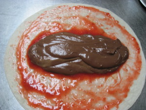 Add the chocolate cream, ideally it should be a little firmer like the picture above. It will be easier for you to roll.