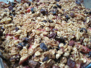 When the fruit is bubbling in the sauce, add the granola topping, turn the oven off and return the baking dish to the oven and keep warm until ready to serve