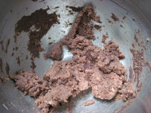 Add the melted chocolate, egg white and finely ground chocolate until it looks like a paste
