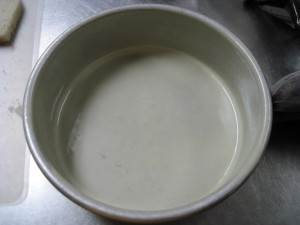 grease cake pan to mold capirotada