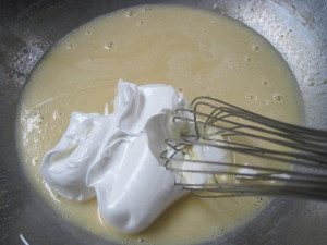 Add a little French meringue to lighten batter for Coconut Rum Cake