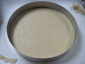 Score the dough and place back into the freezer to chill before filling with batter and jam
